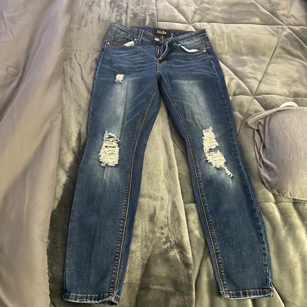 Woman’s Distressed Jeans